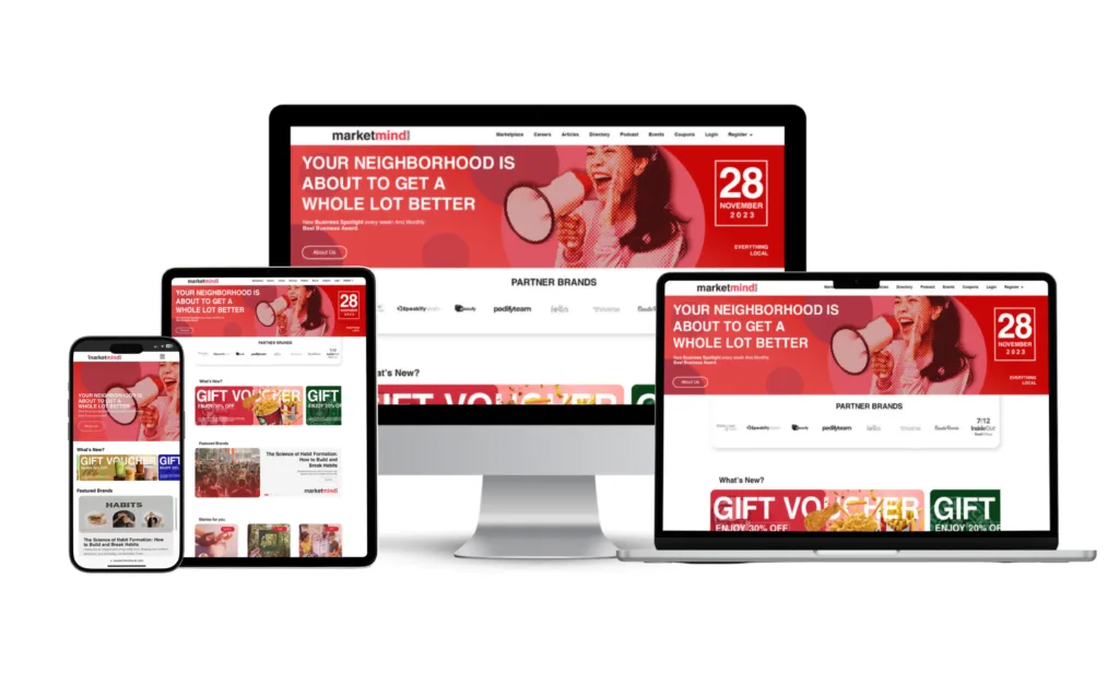 The WordPress website for MarketMind Local showcased on a computer, tablet, and phone