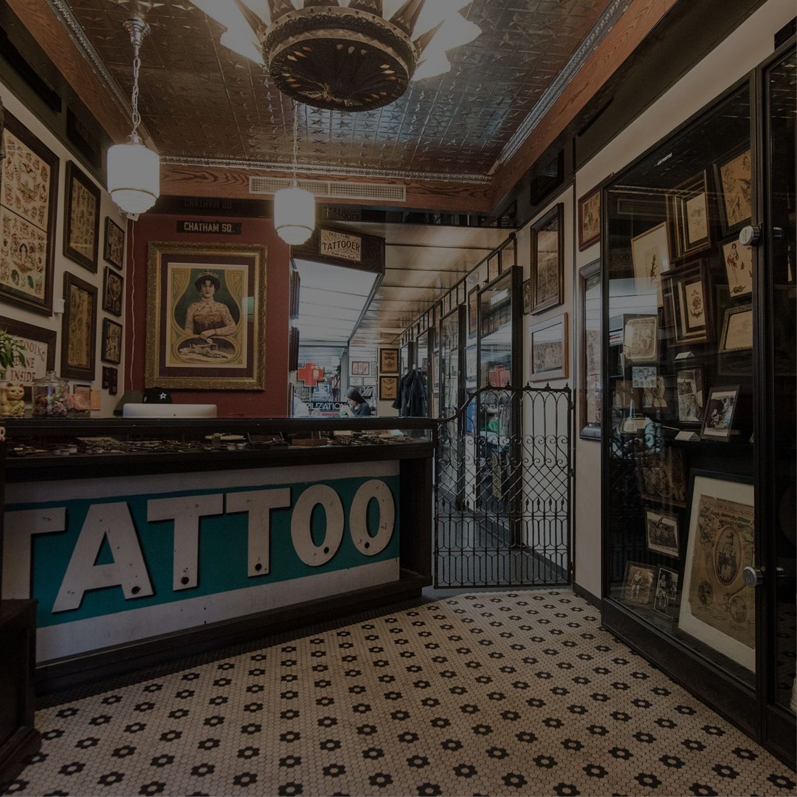 A tattoo shop with a sign that says tattoo