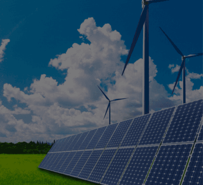 Renewable energy sources: solar panels and wind turbines in a field