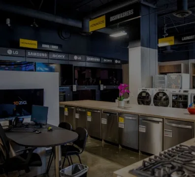 Sink and stove in a kitchen at an appliance store