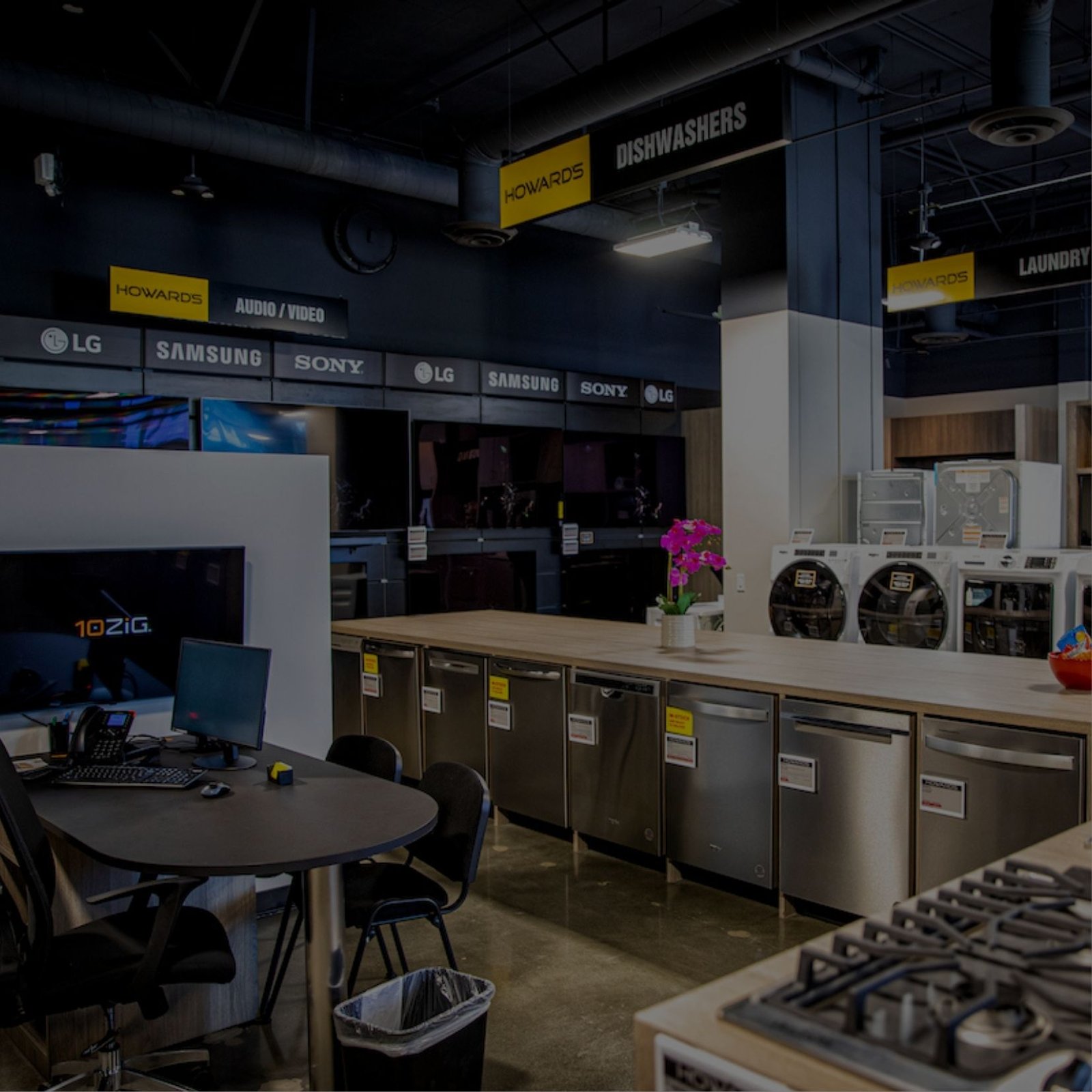 Sink and stove in a kitchen at an appliance store