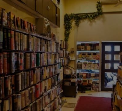 An image of a bookstore displaying numerous books on shelves