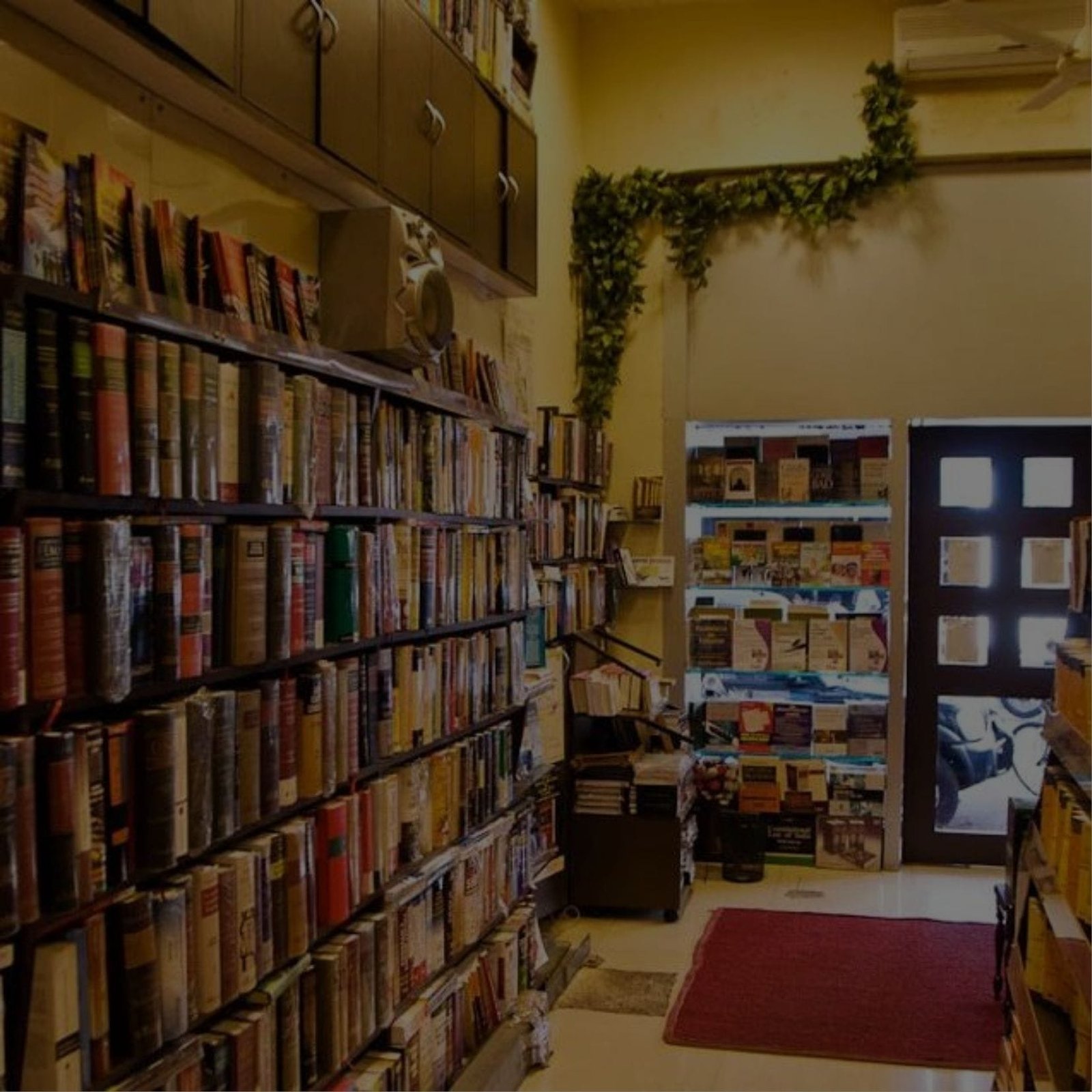 An image of a bookstore displaying numerous books on shelves