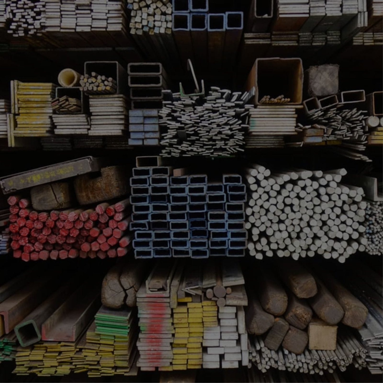 A heap of metal pipes and materials, commonly used in construction, at a building supply store