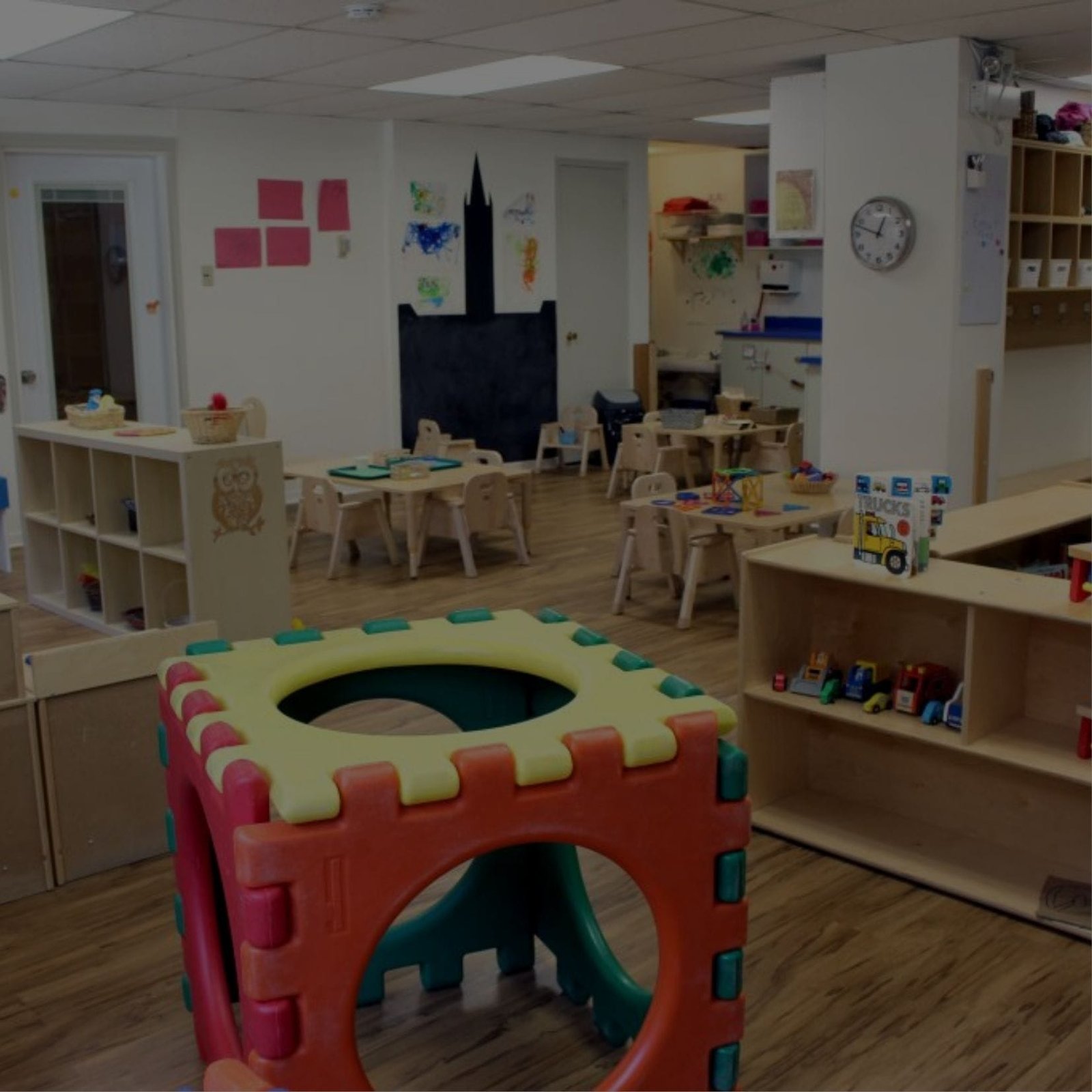 A colorful playroom filled with toys and furniture for children to enjoy and have fun