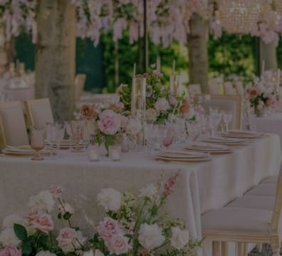 An event planner organizing a conference with a stage, chairs, and a podium