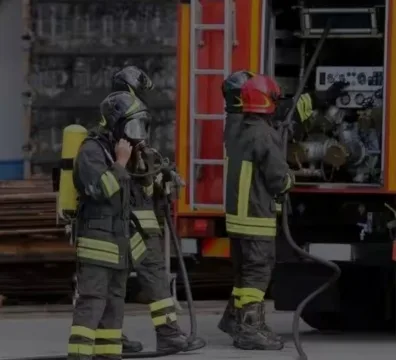 Firefighters Fire Station working on a fire truck, preparing equipment to combat a fire