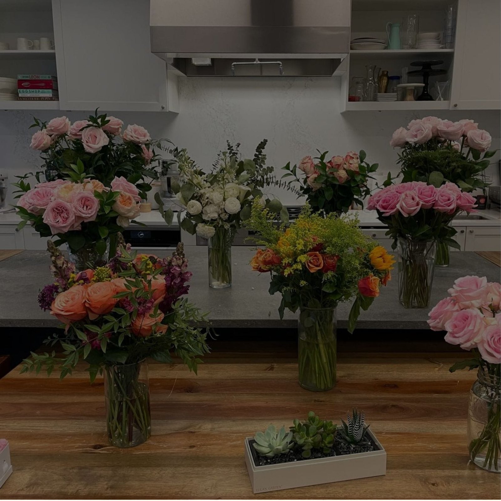 colorful vases of flowers in a flower shop