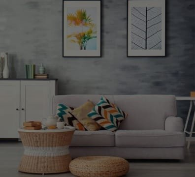 Furniture Maker and Shop a cozy living room with a couch, coffee table, and table