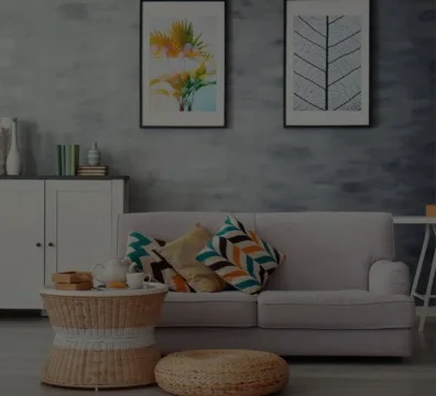 Furniture Maker and Shop a cozy living room with a couch, coffee table, and table