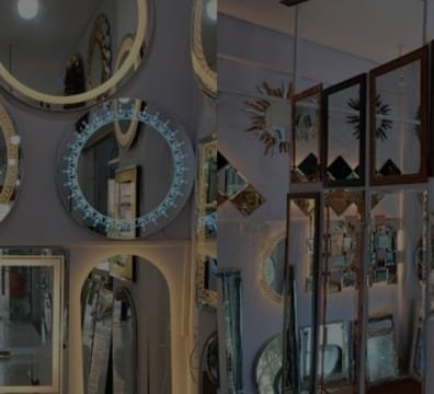 A glass store with various glass products on display.