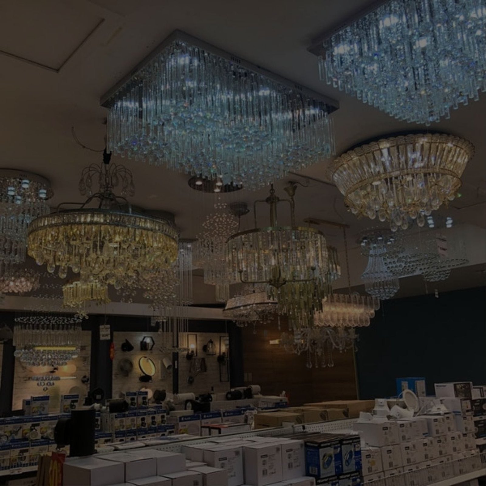 A store filled with beautiful chandeliers and lights.