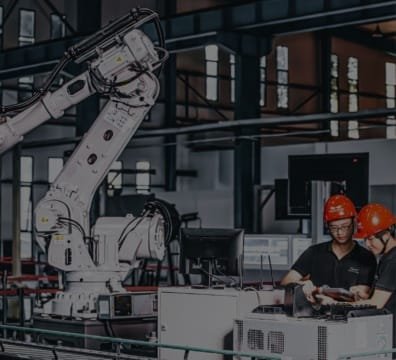 Two men working in a factory