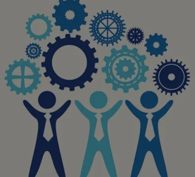 Business people collaborating with gears cogs and other services