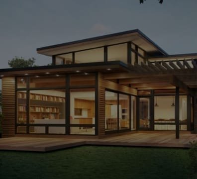 Sleek Prefabricated house companies showcasing ample deck space and expansive windows