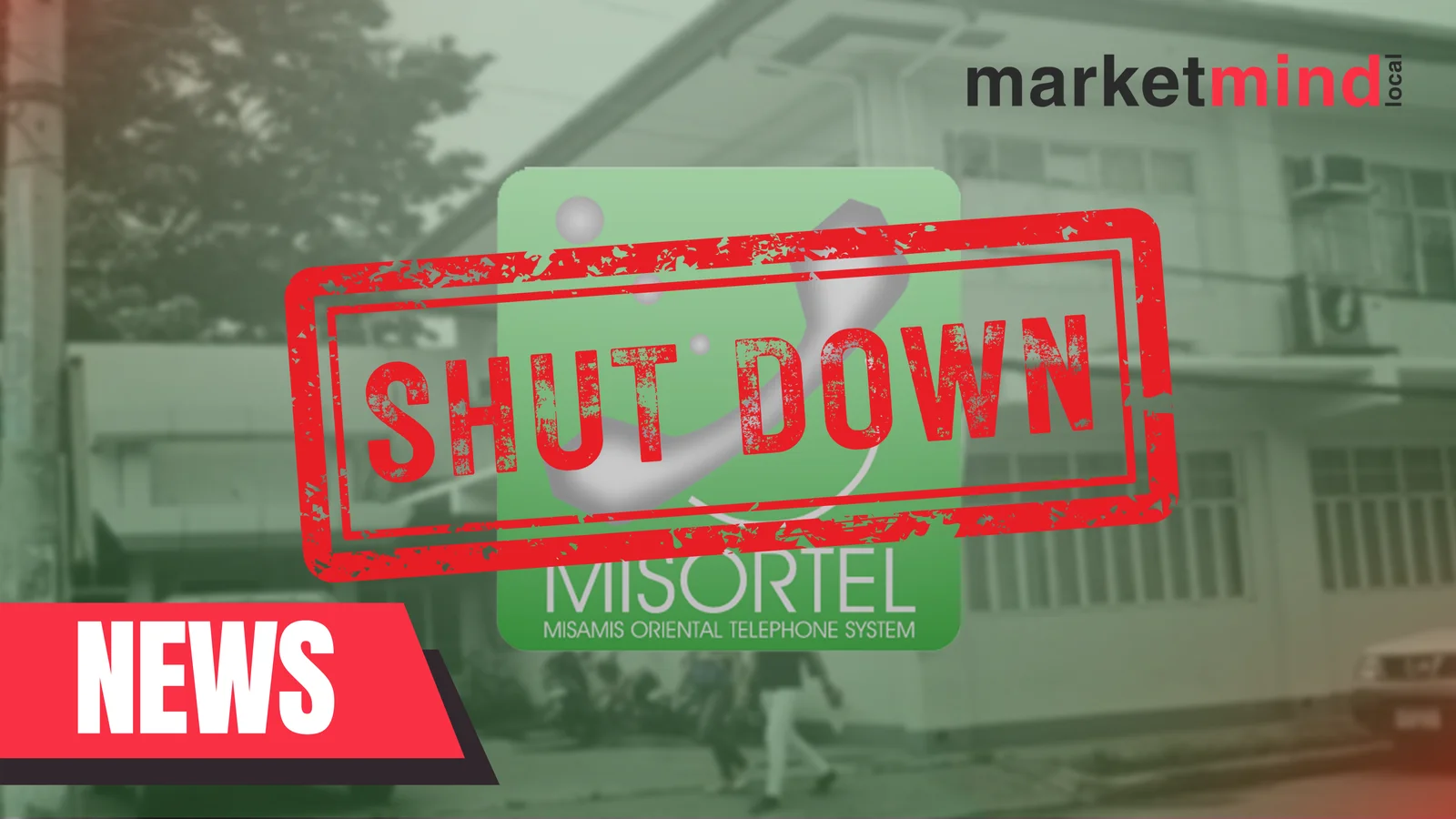 Telephone System case. Image: 'MisOrTel Shutdown' - a sign with school building in the background.