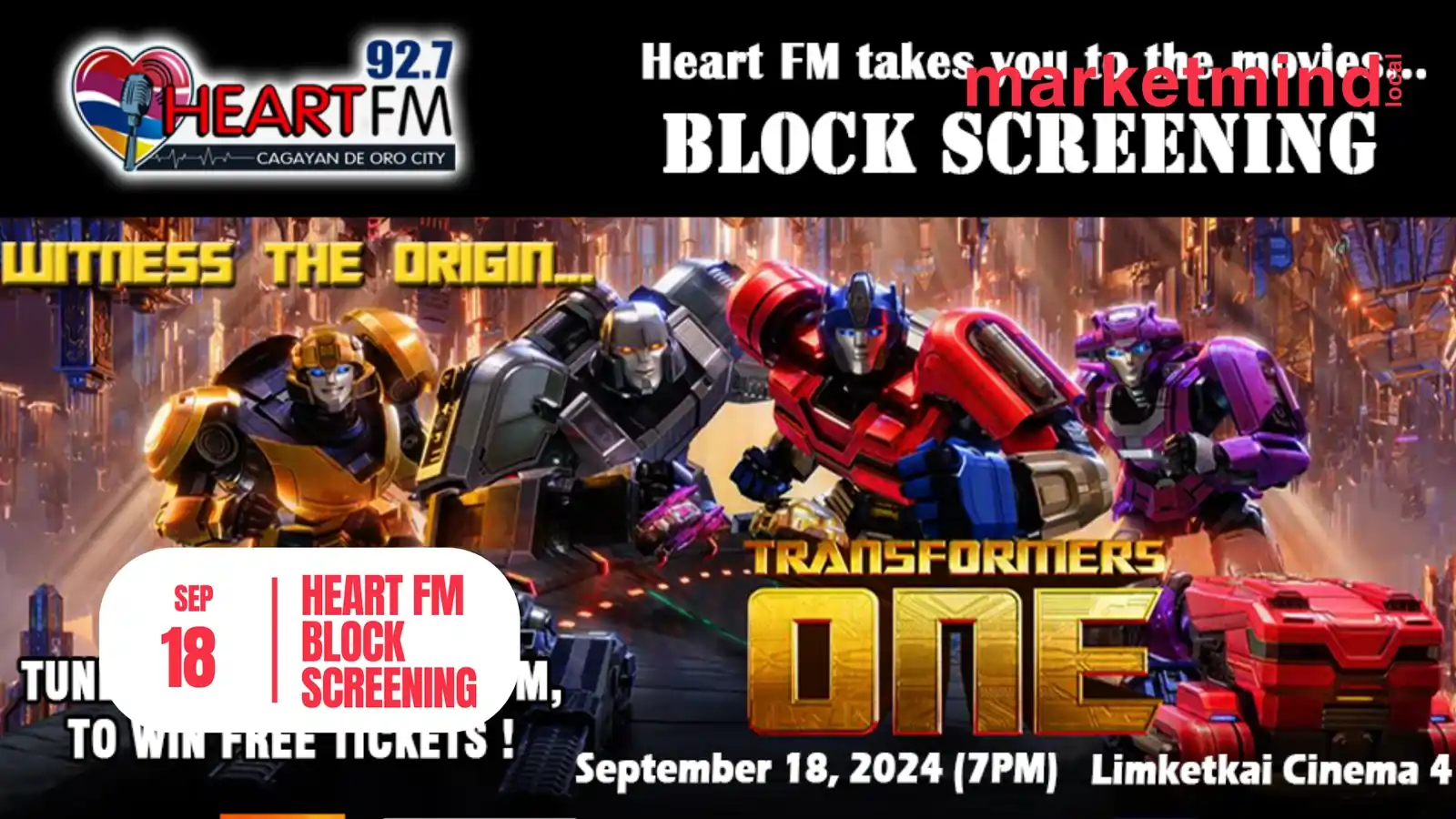 1. A vibrant movie screening event for "Transformers One," showcasing fans enjoying the film together in a theater setting.